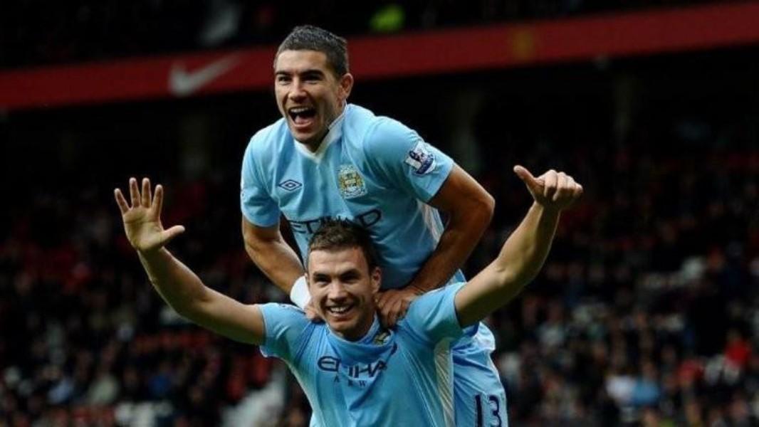 Dzeko e Kolarov con la maglia del Manchester City