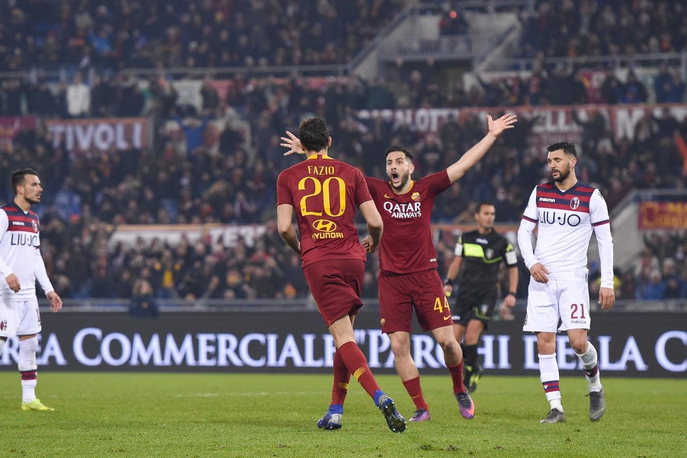 Fazio e Manolas esultano dopo il 2-0, di LaPresse