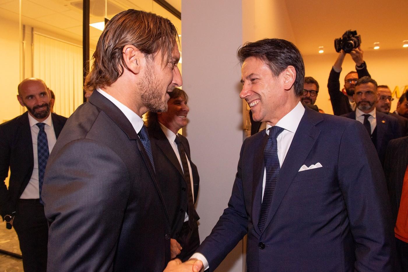 Giuseppe Conte incontra Francesco Totti, di LaPresse