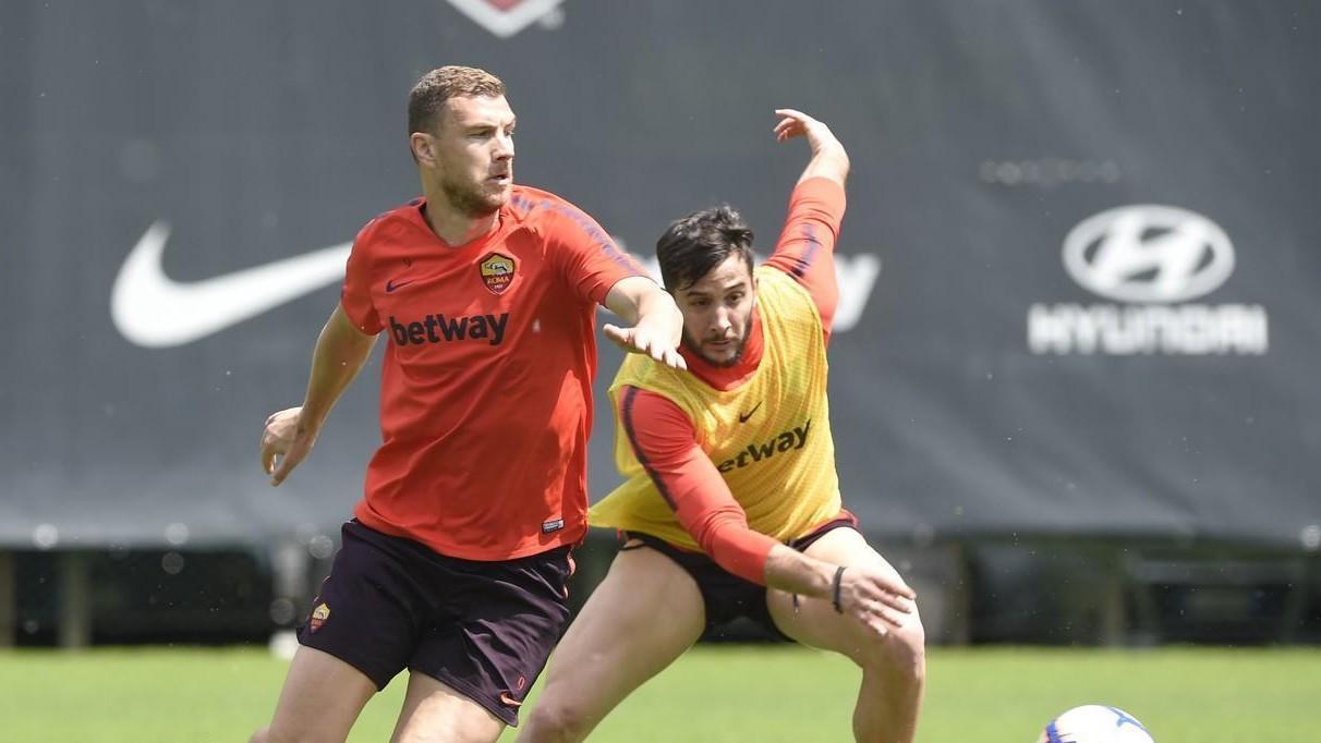 Dzeko e Manolas in allenamento, di LaPresse