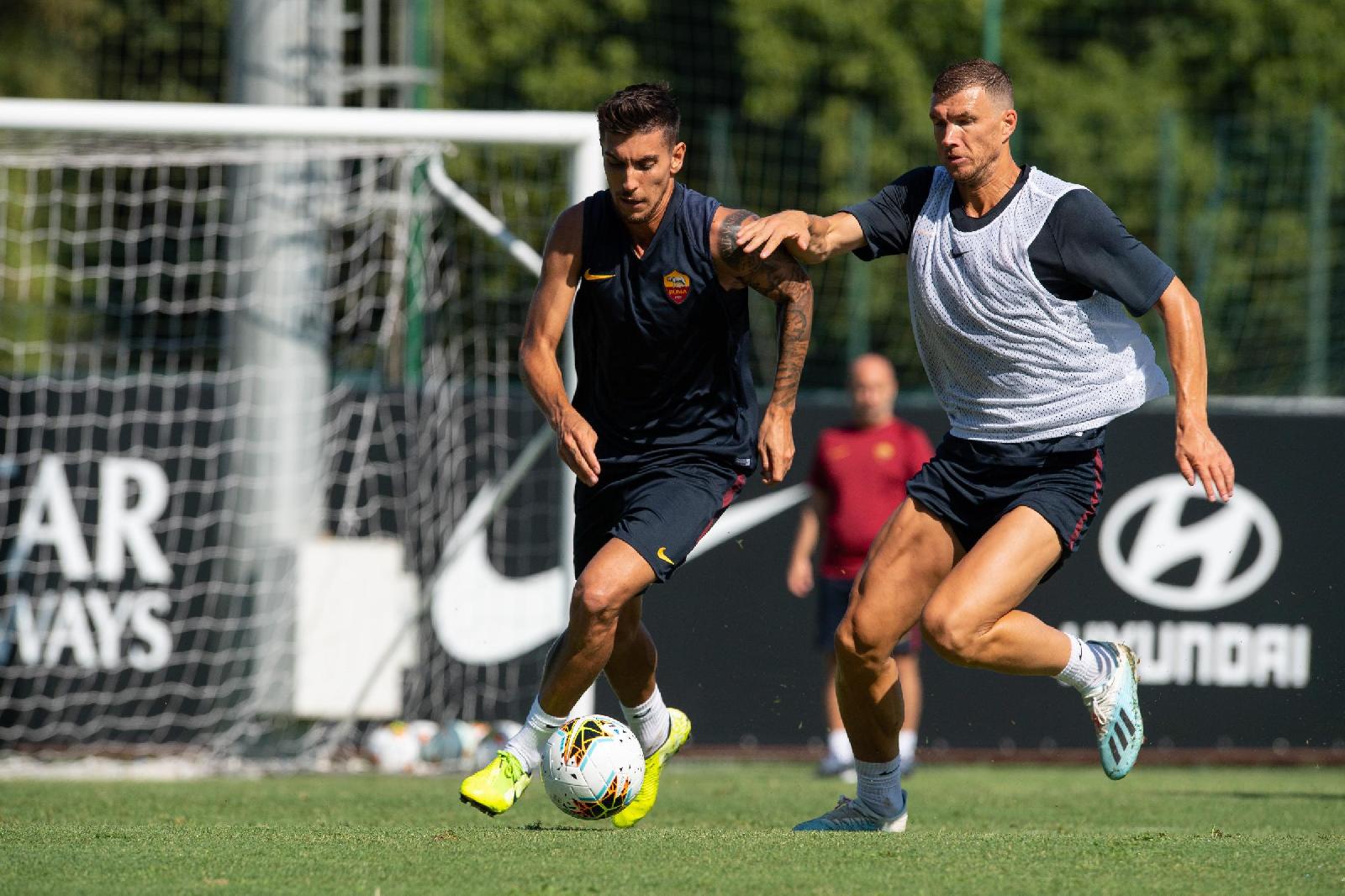 Dzeko e Pellegrini a contrasto, di LaPresse