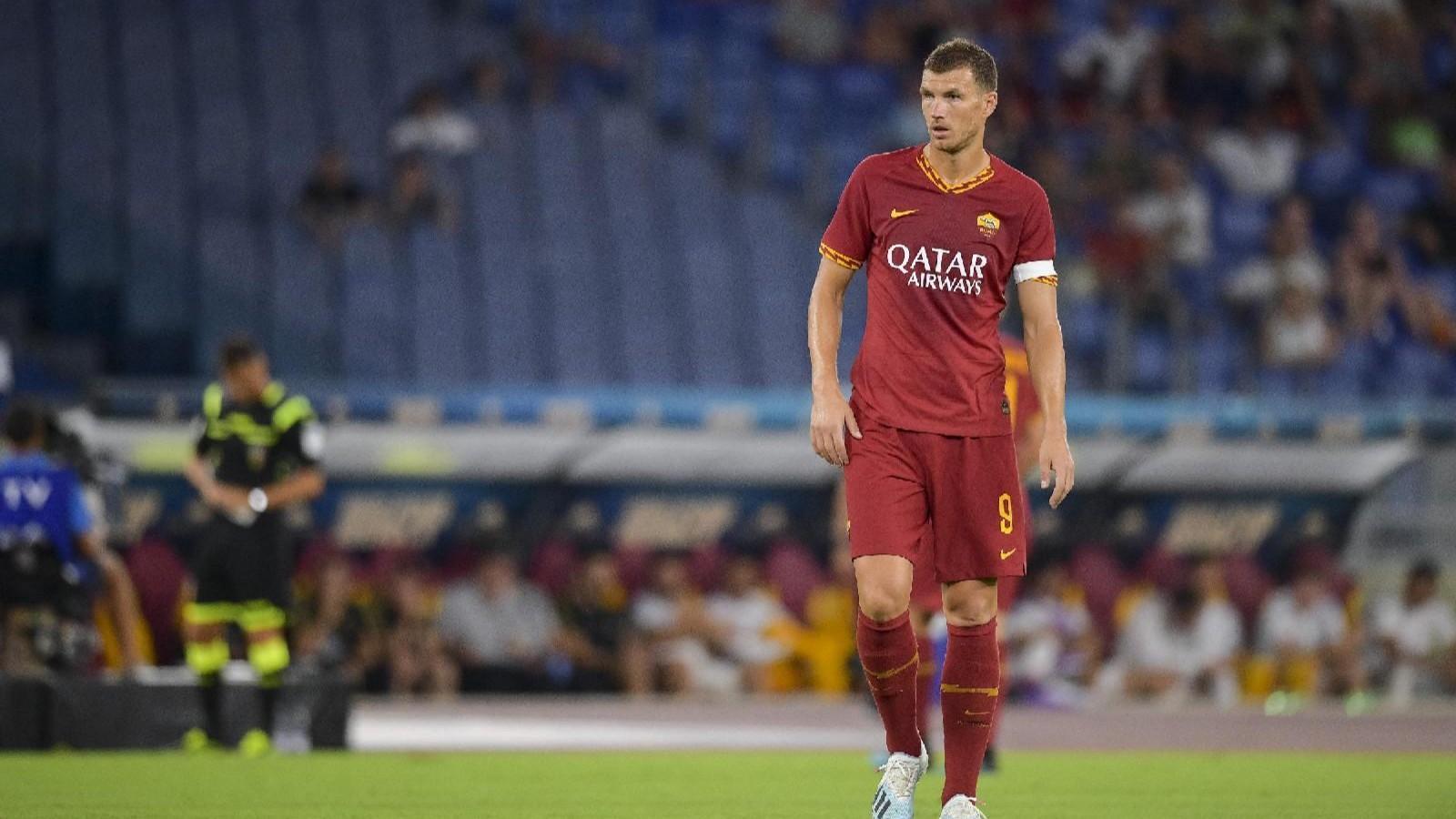 Edin Dzeko con la fascia durante Roma-Real Madrid, di LaPresse