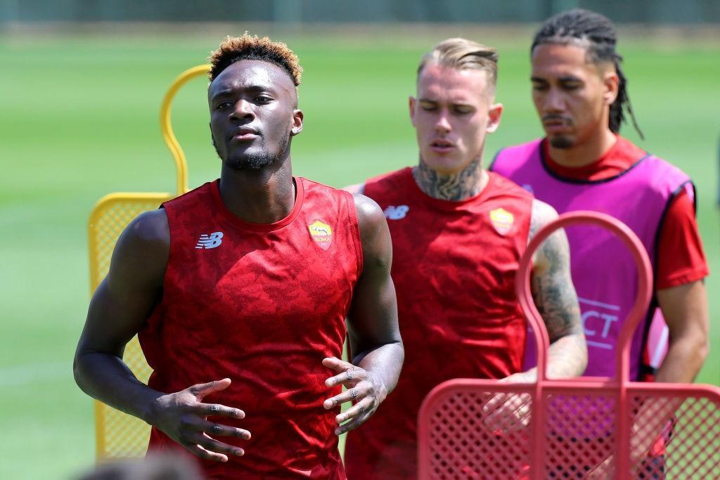 Abraham, Karsdorp and Smalling training in Trigoria (As Roma via Getty Images)