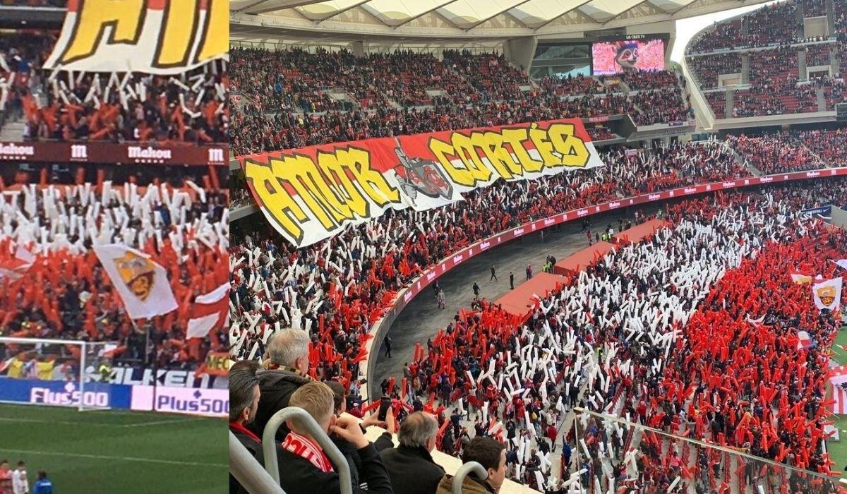 FOTO - L'Atletico Madrid ha sfidato il Siviglia con una bandiera della Roma in curva