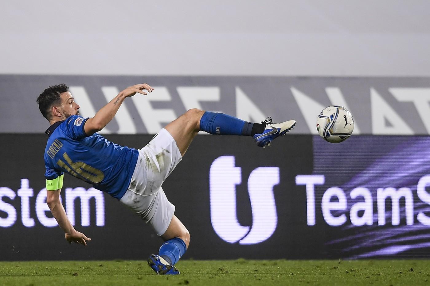Alessandro Florenzi in azione con la maglia dell'Italia, di LaPresse