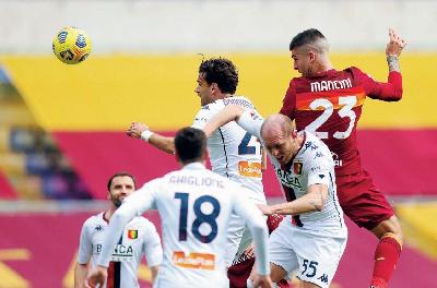 7 marzo 2021: con questo stacco di testa Mancini segna il gol della vittoria sul Genoa, ultimo lunch match della Roma @Getty Images
