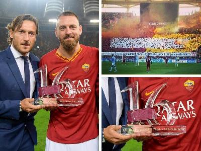 FOTO - De Rossi: il riconoscimento è ispirato da una coreografia della Curva Sud FOTO - De Rossi: il riconoscimento è ispirato da una coreografia della Curva Sud
