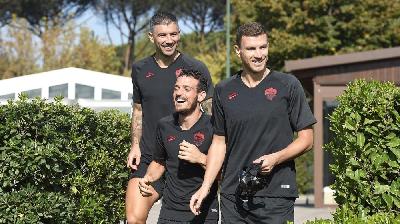 Kolarov, Florenzi e Dzeko prima della rifinitura di ieri