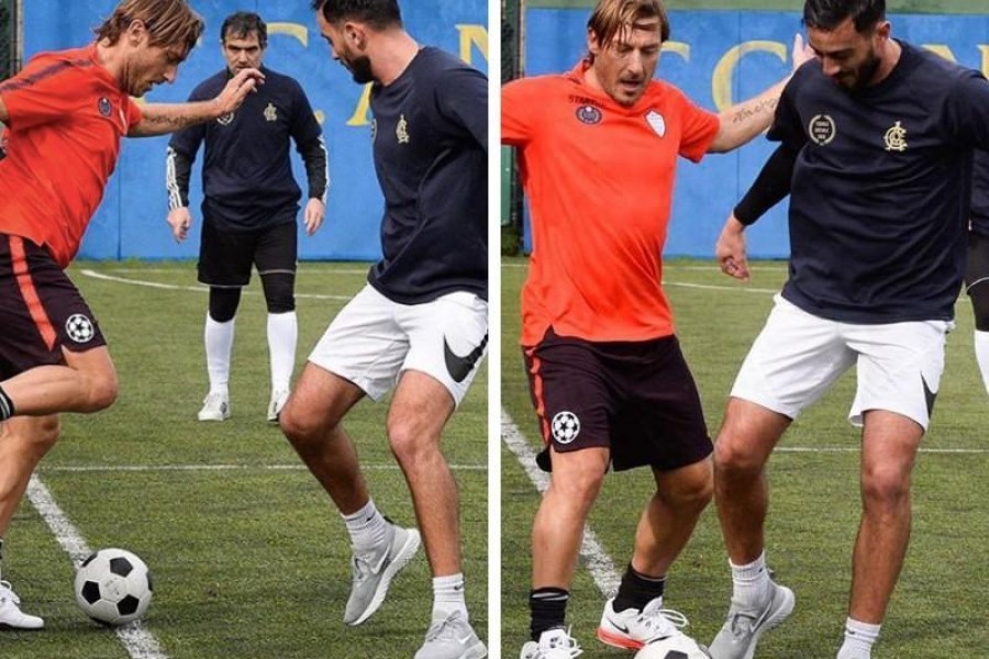 Alberto Aquilani e Francesco Totti in azione