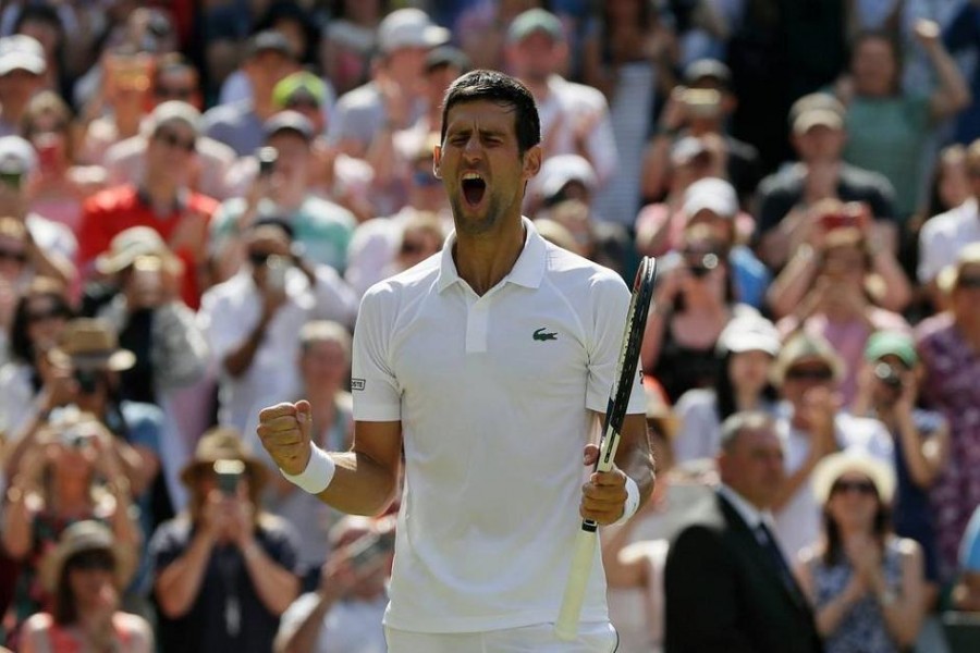 L'esultanza di Novak Djokovic che in finale ha battuto Roger Federer