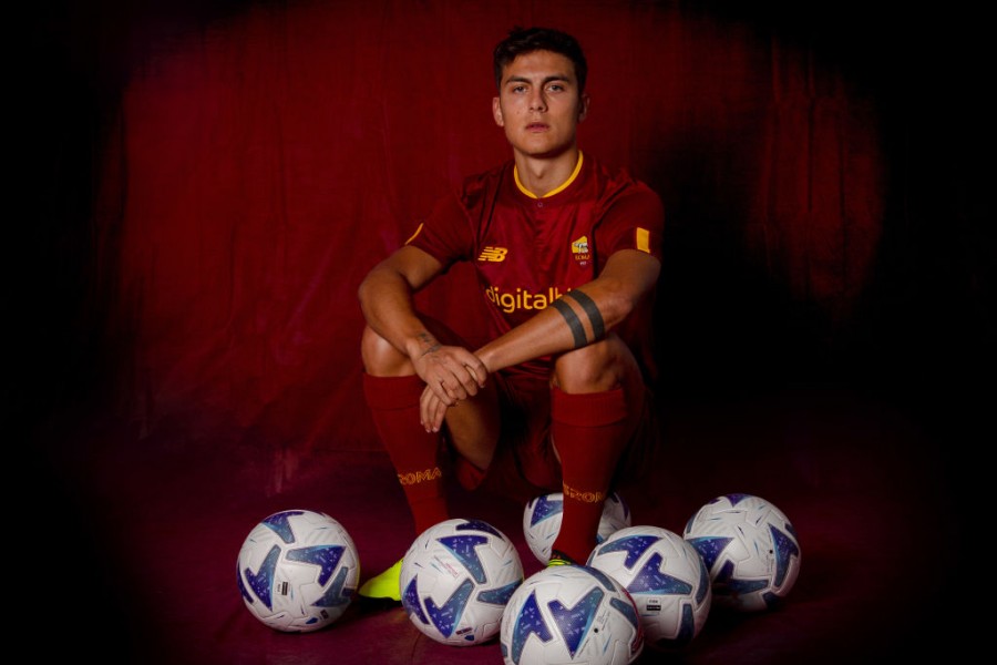 Paulo Dybala with As Roma's shirt