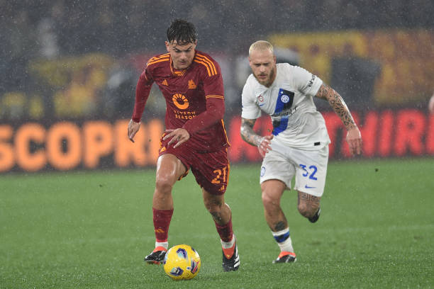 Dybala e Dimarco in azione durante Roma-Inter